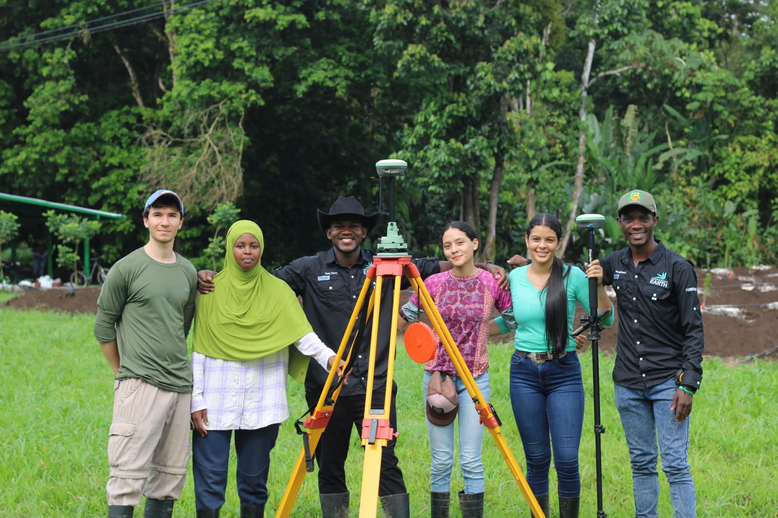 Survey team with total station
